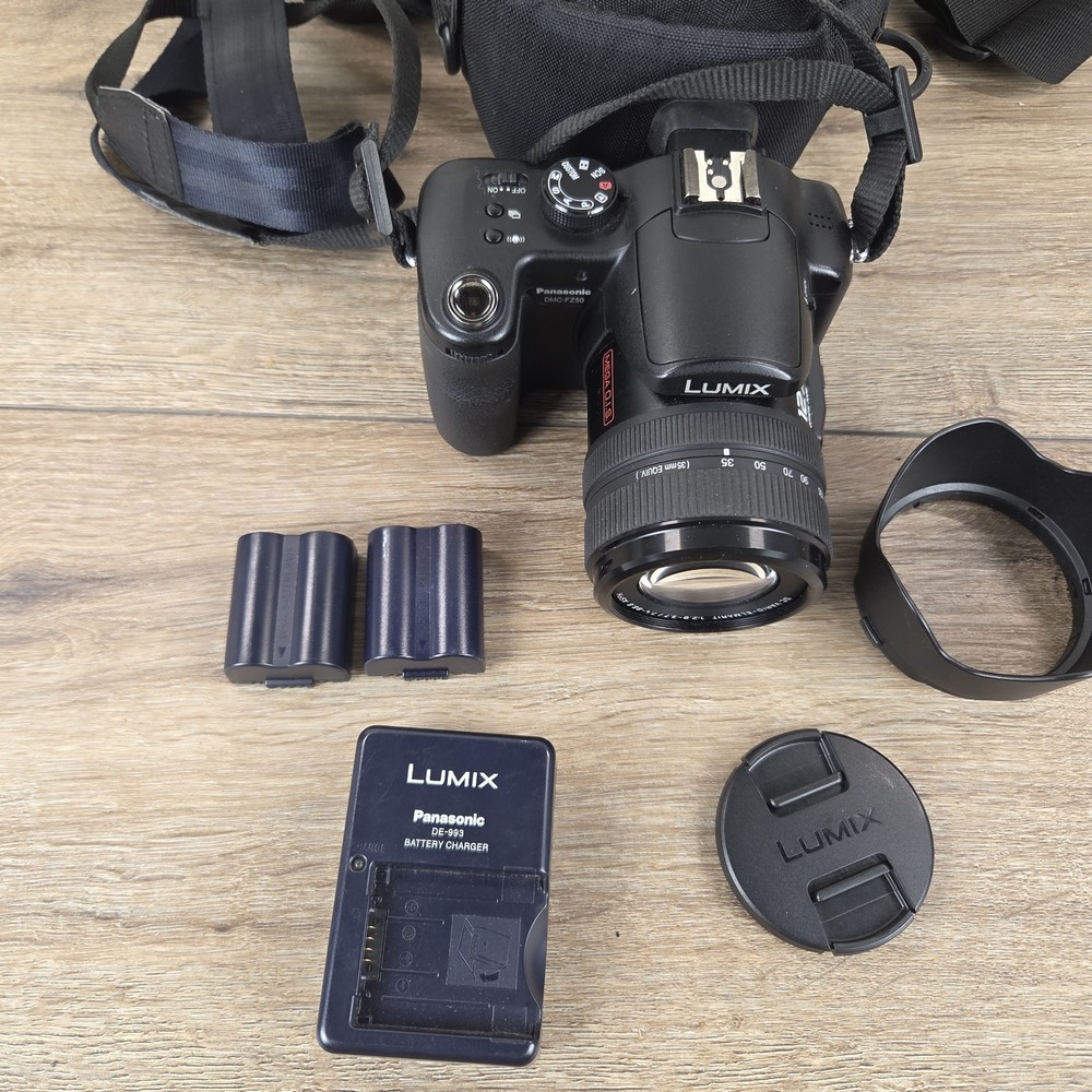 Panasonic LUMIX DMC-FZ50 10.1MP Digital Camera Black w/ Charger & 2 Batteries - Picture 2 of 16